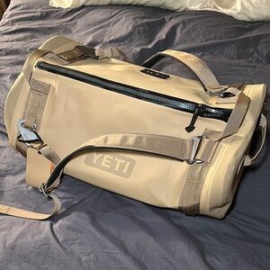 Yeti Tan Duffel Bag with Durable Fabric and Adjustable Strap